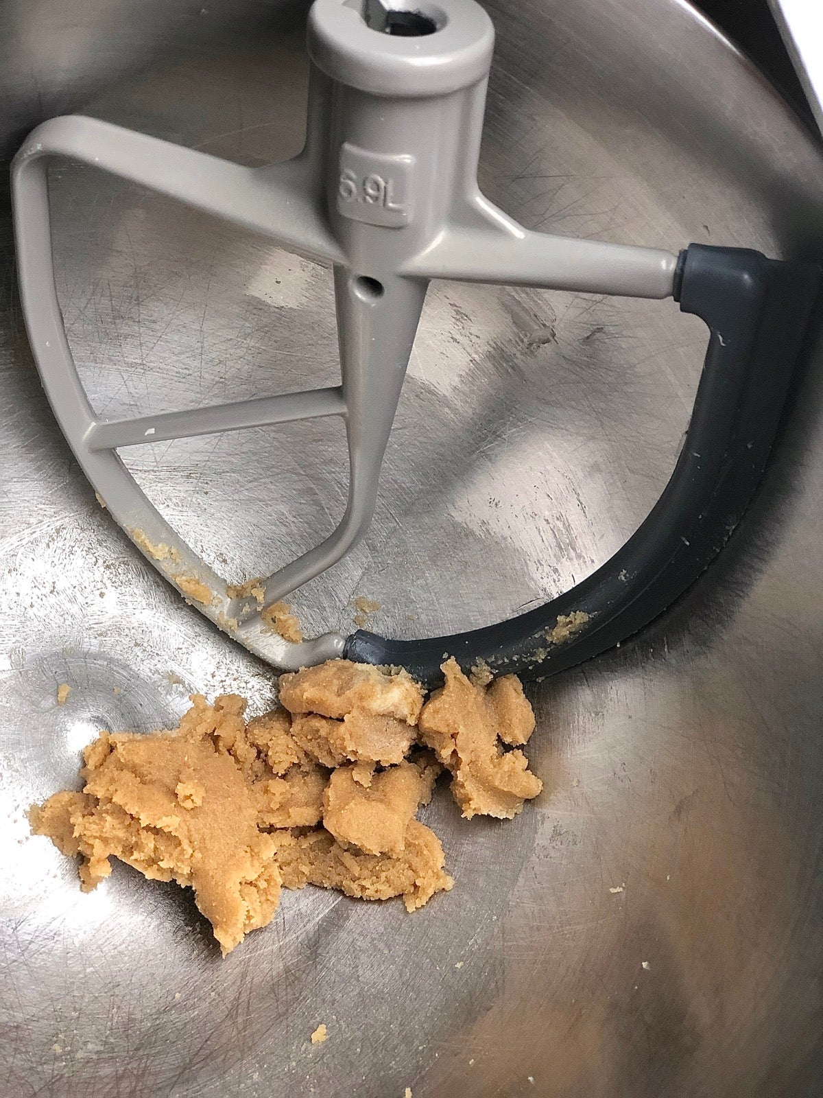 Some ingredients for Gluten-Free Almond Flour Chocolate Chip Cookies mixed in a bowl